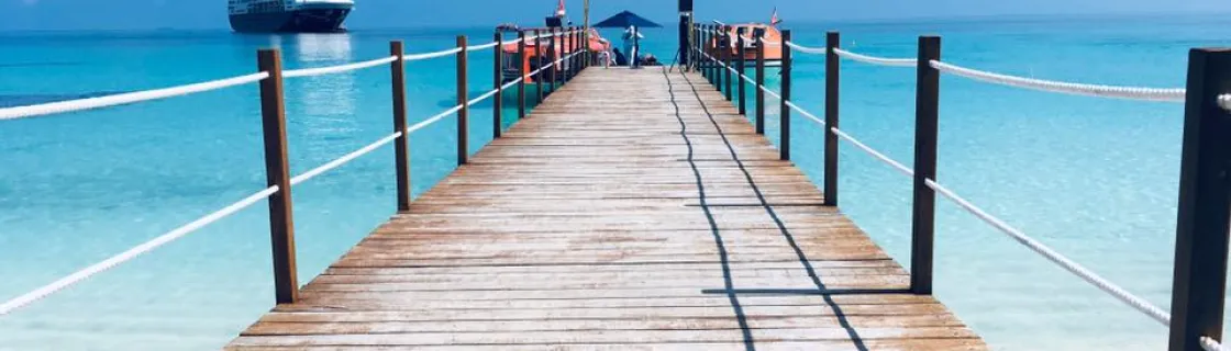 Cruise ship docked at the port of Conflict Islands, Papua New Guinea